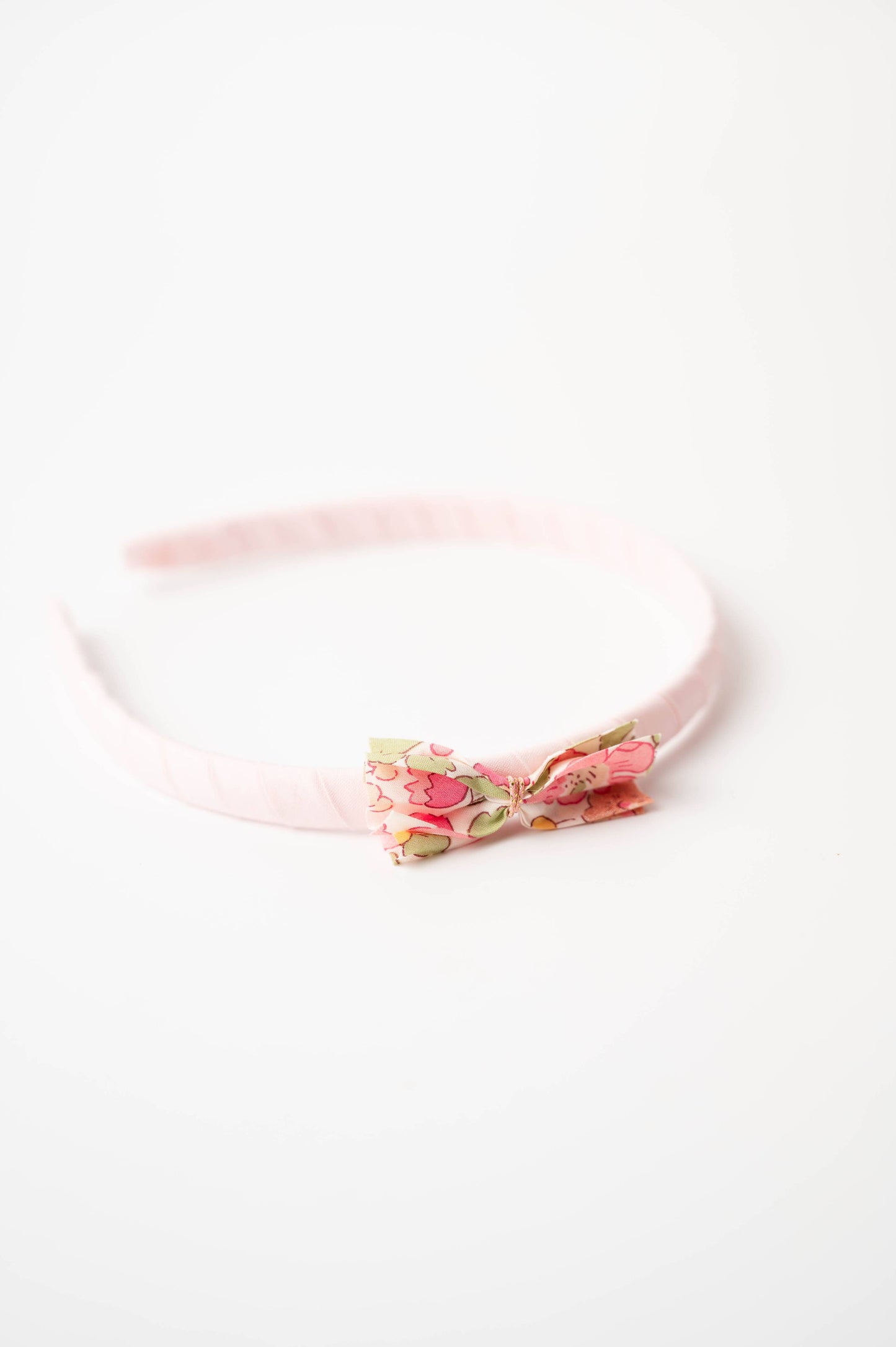 Cerchietto rosa in cotone con fiocco Liberty
