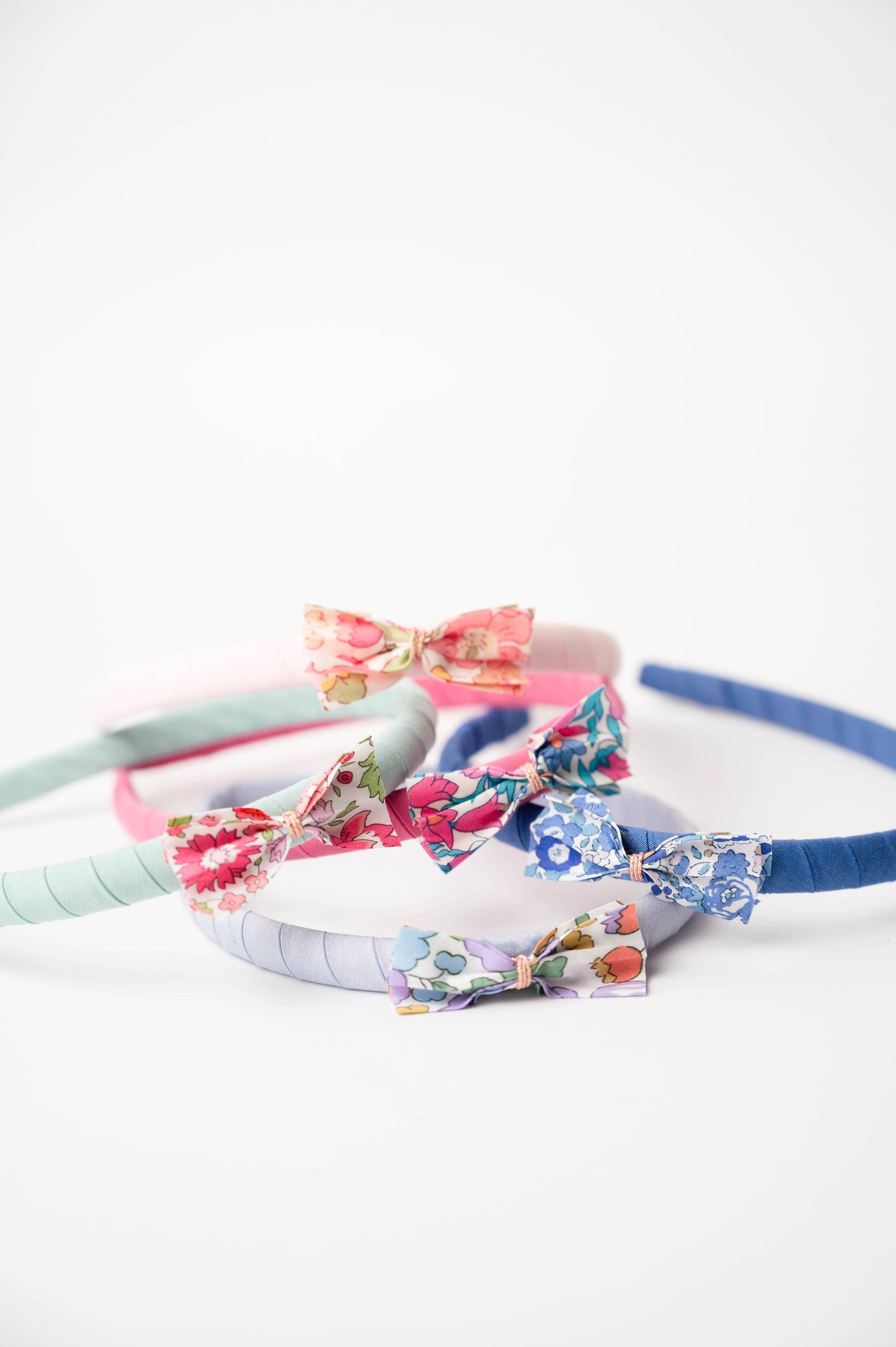 Cerchietto rosa in cotone con fiocco Liberty
