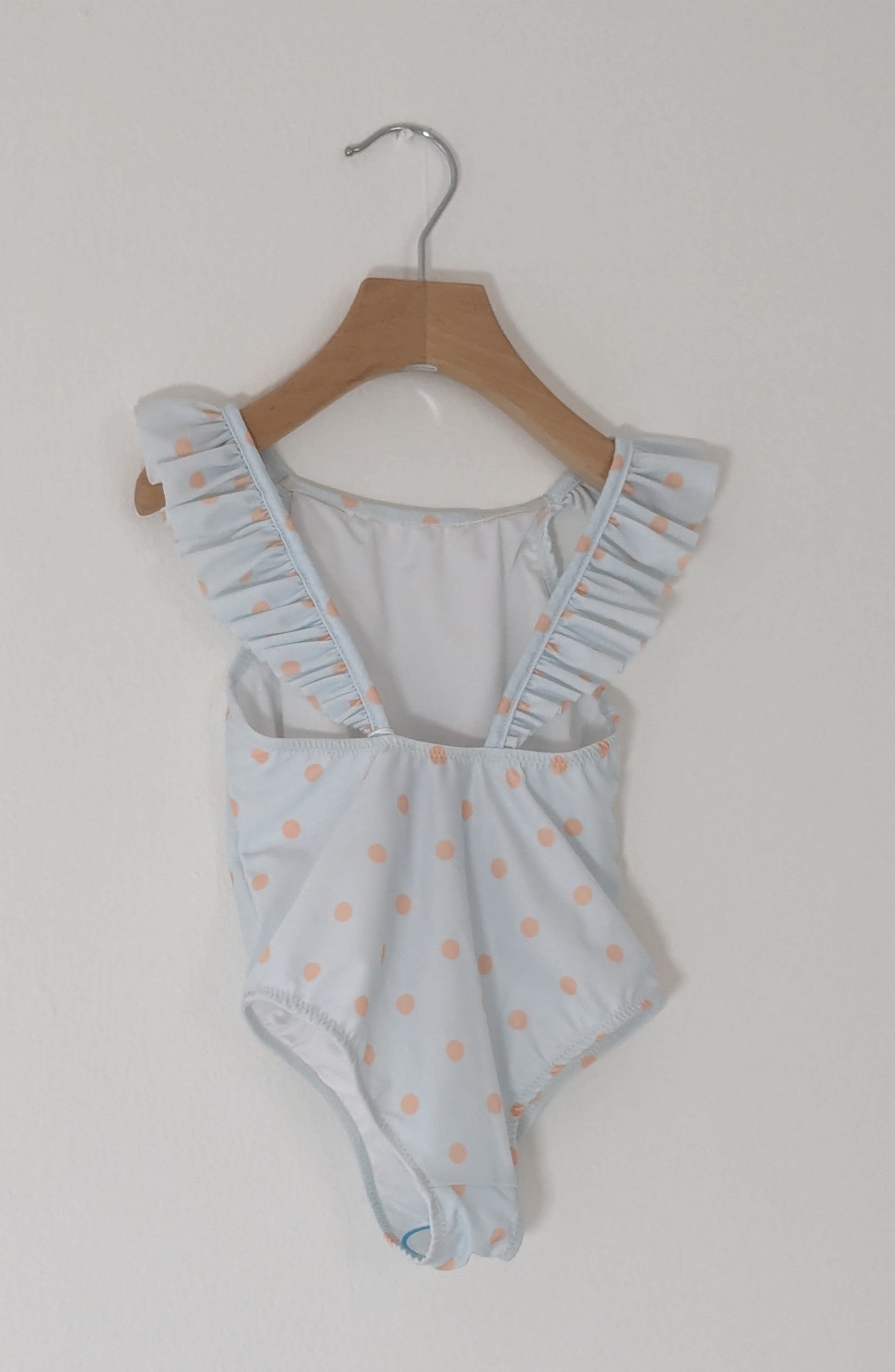 Costume a pois con volant